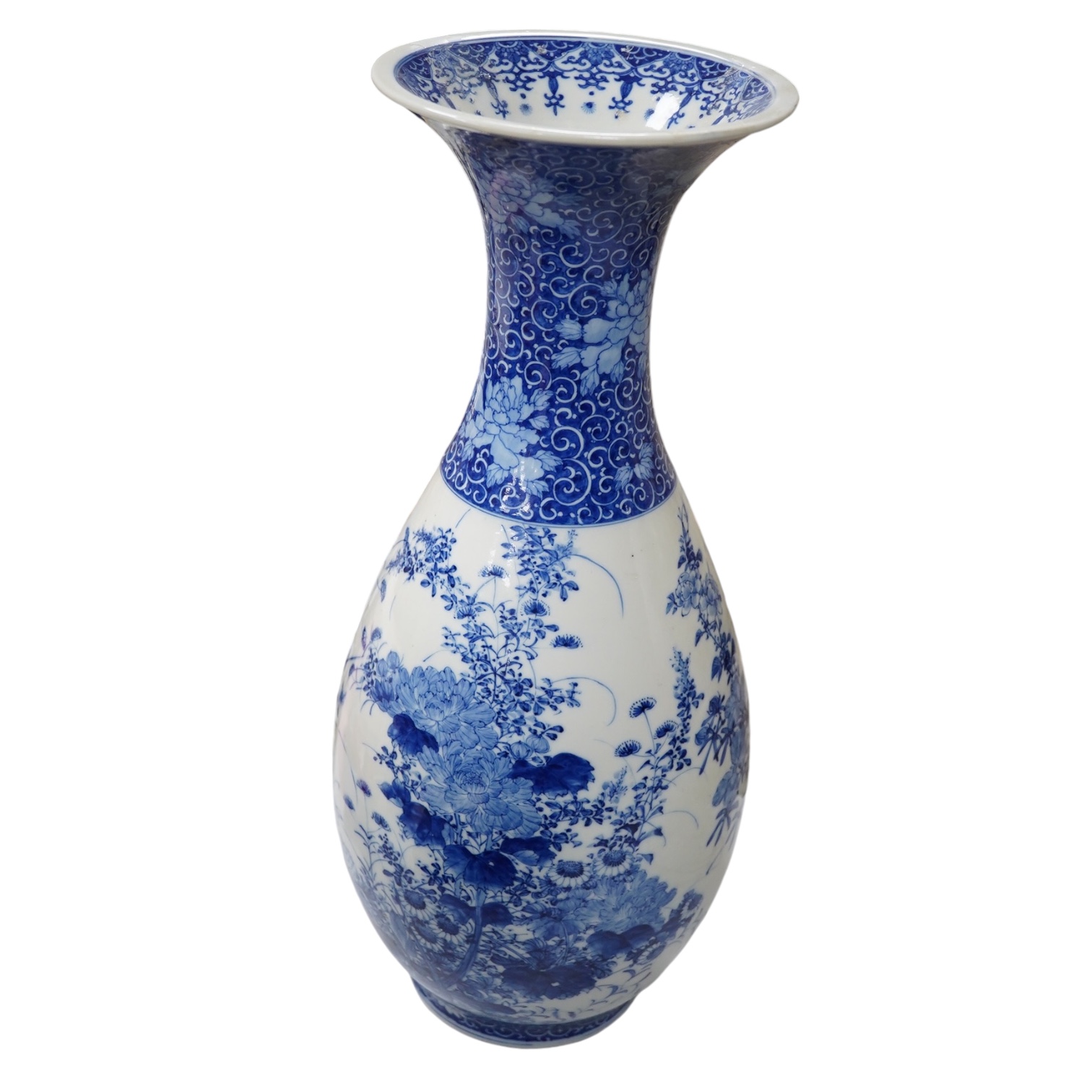 A large Japanese blue and white baluster vase, height 46cm. Condition - restoration to the rim